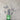 Green screwdriver with multiple drill bits on a concrete surface