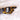 Black and orange Klein Tools glove on architectural blueprints