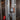 Klein Tools speaker attached to metal framework in an indoor setting