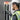 Person in safety gear checking electrical panel with a device