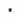 Black cylindrical metal component on a white background